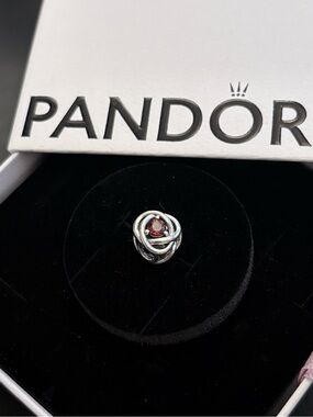 Pandora Silver Knot Charm with Ruby Red Center